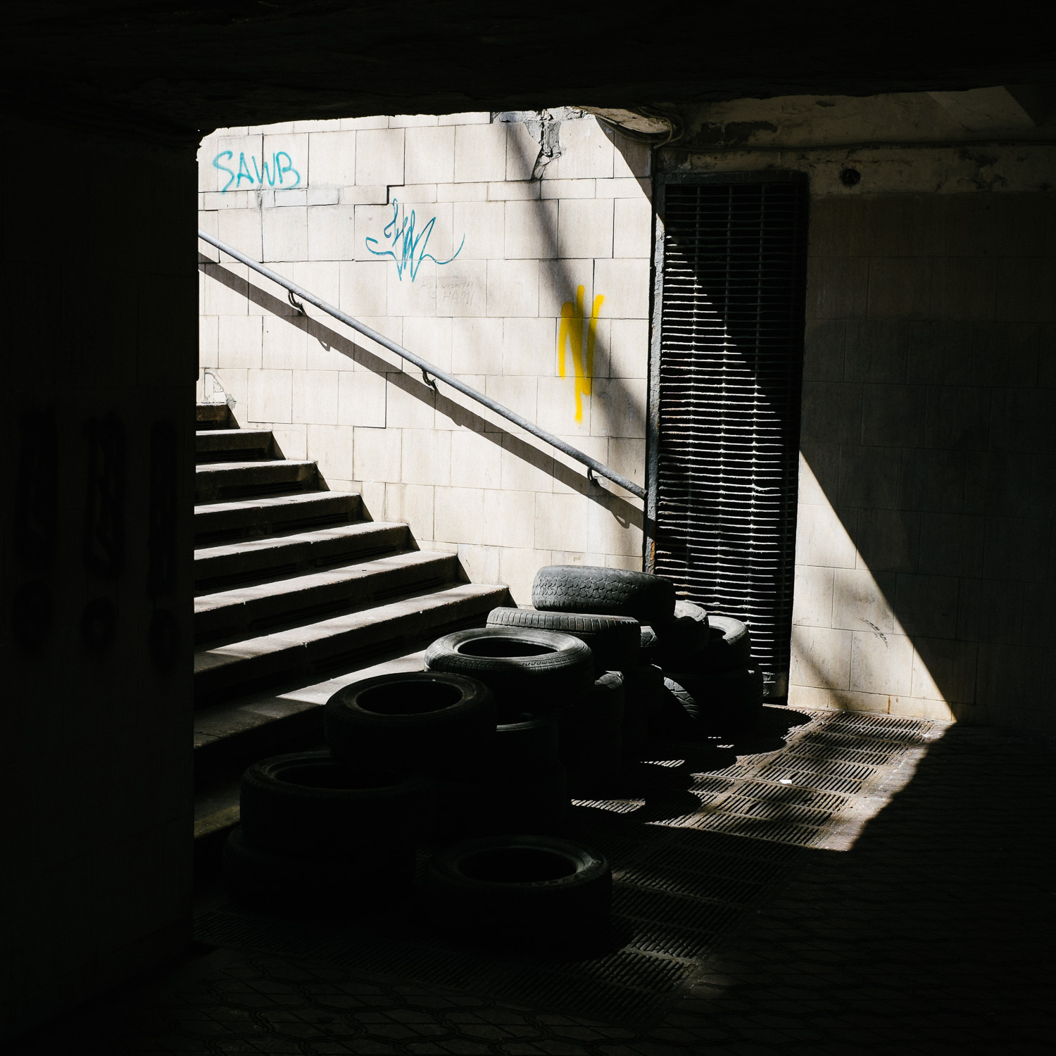  Tires in an underpass underneath Independence Square. 