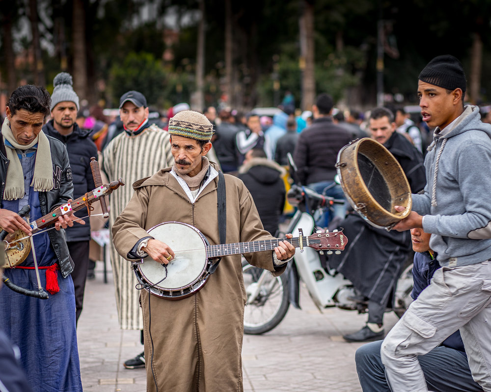  Moroccan street musicians play for tips in the market square. 