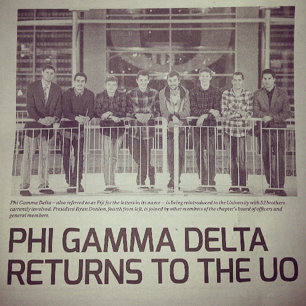Caption reads: "Phi Gamma Delta - also referred to as Fiji for the letters in its name - is being reintroduced to the University with 52 brothers currently involved. President Ryan Donlon, fourth from left, is joined by other members of the chapter's board of officers and general members."