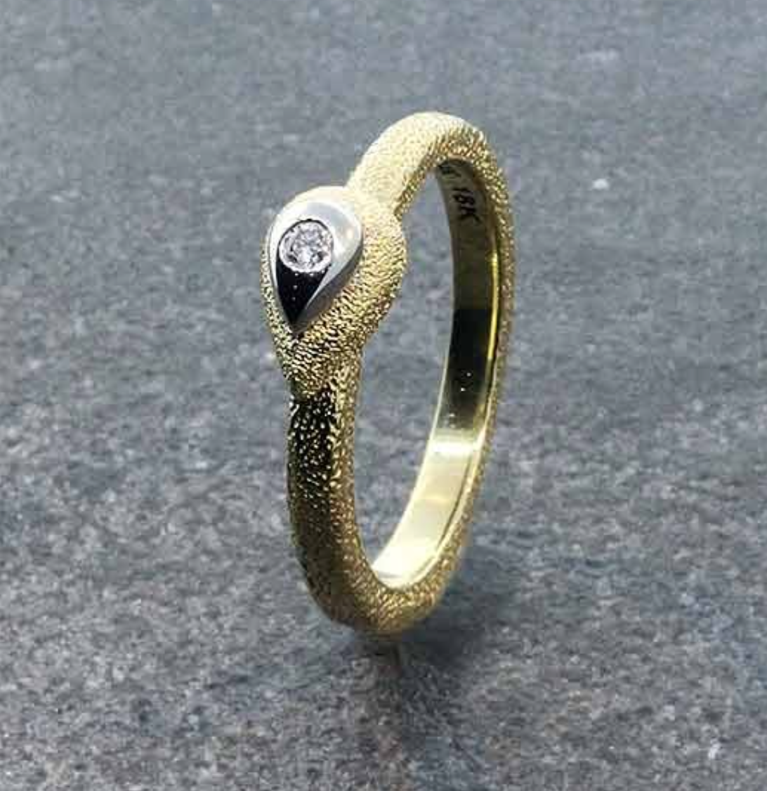 Rhyme & Reason 18k yellow gold and diamond ring, via Earthworks . 