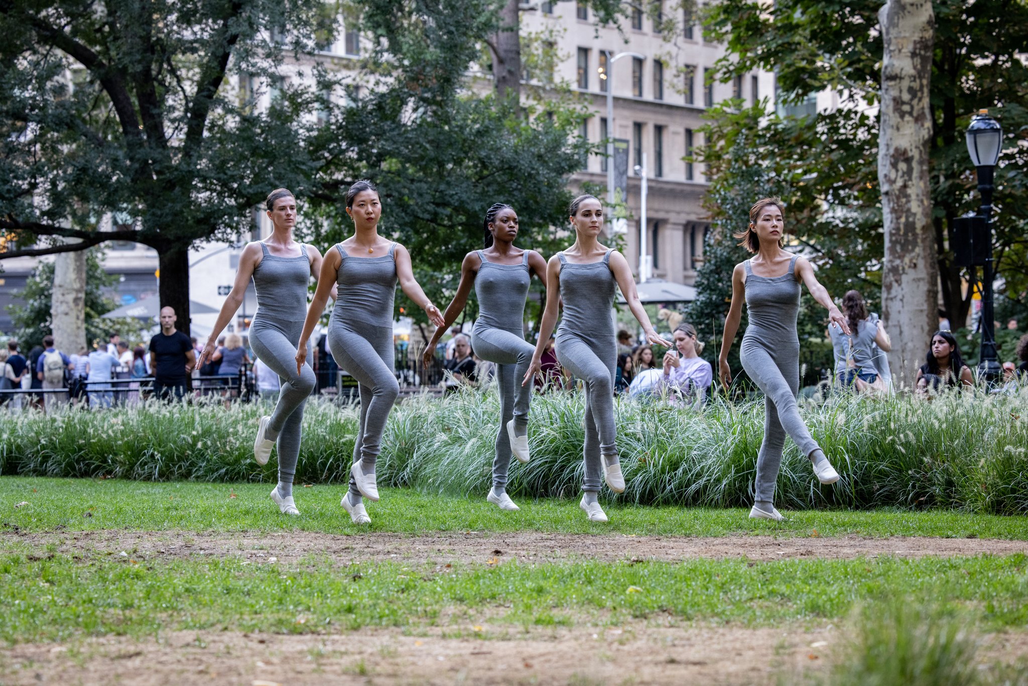  Full Ensemble in Beau Bree Rhee, Shadow of the Sea, 2022. Performance view, Madison Square Park, September 21, 2022. Presented by The Kitchen in partnership with Madison Square Park Conservancy. Artwork pictured: Cristina Iglesias (Spanish, b. 1956)