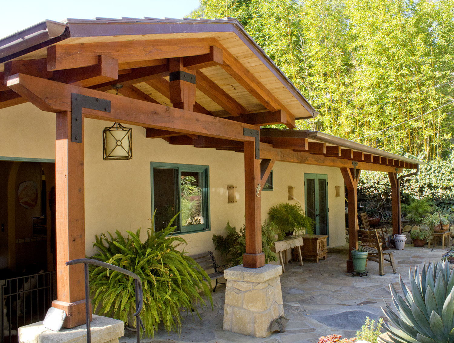 A mixture of wood and stone create an entry with integrity that welcomes you home. 