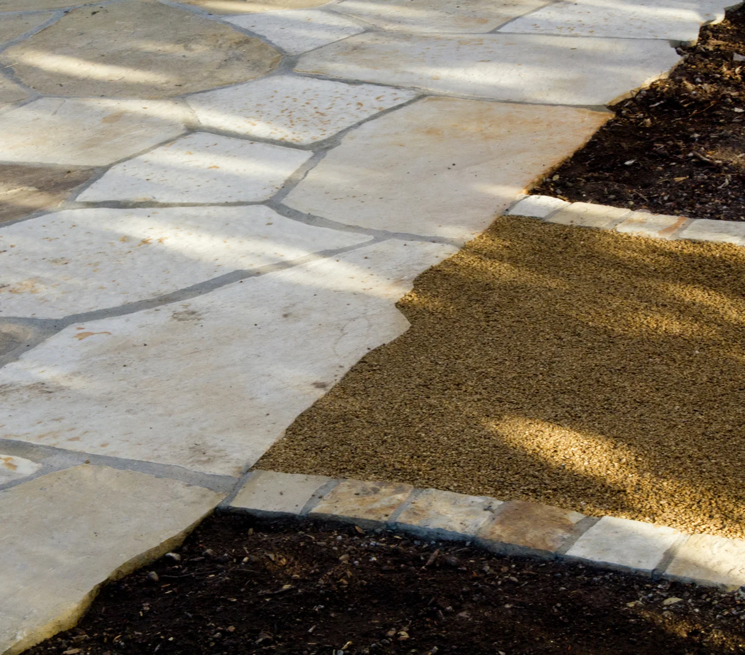 Blending flagstone patio to pathway. 