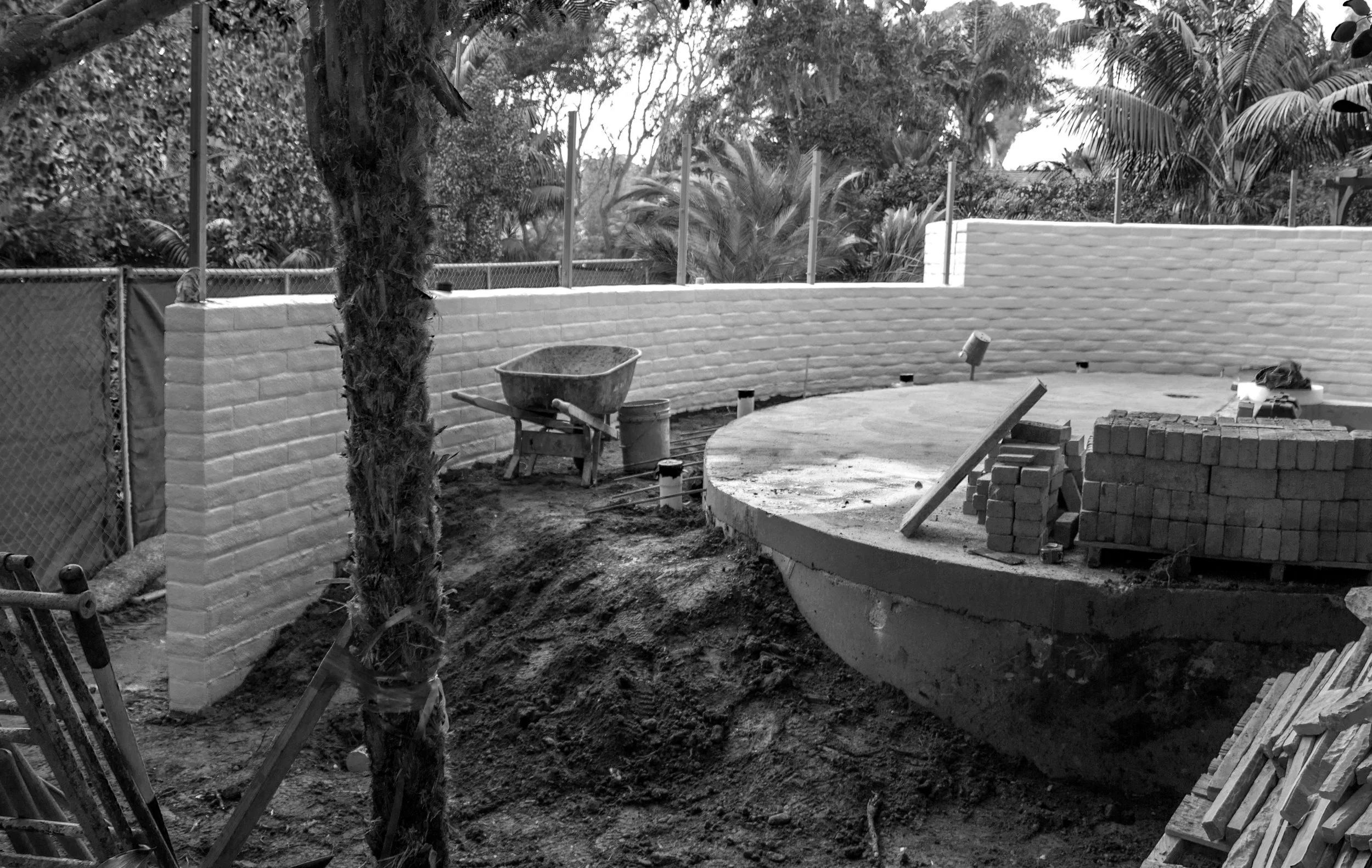 Creating new upper deck areas, proving levels to each patio area containing spa and fire pit areas. 