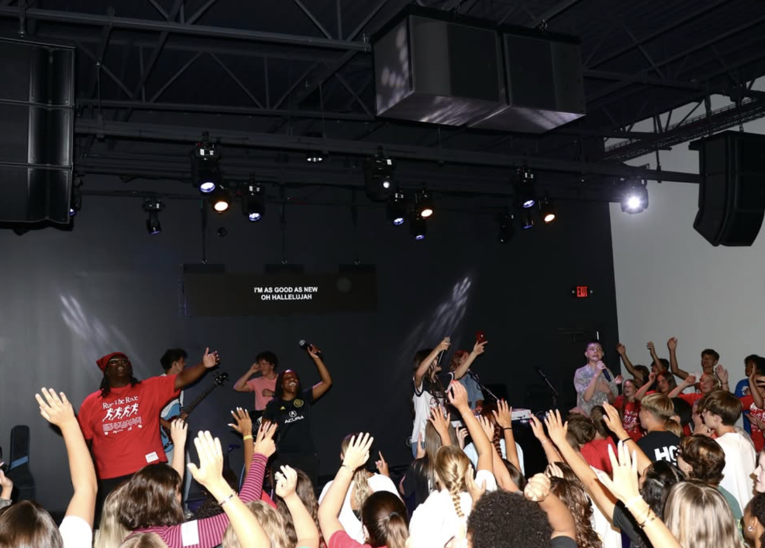 Students worshiping together at LWC Youth