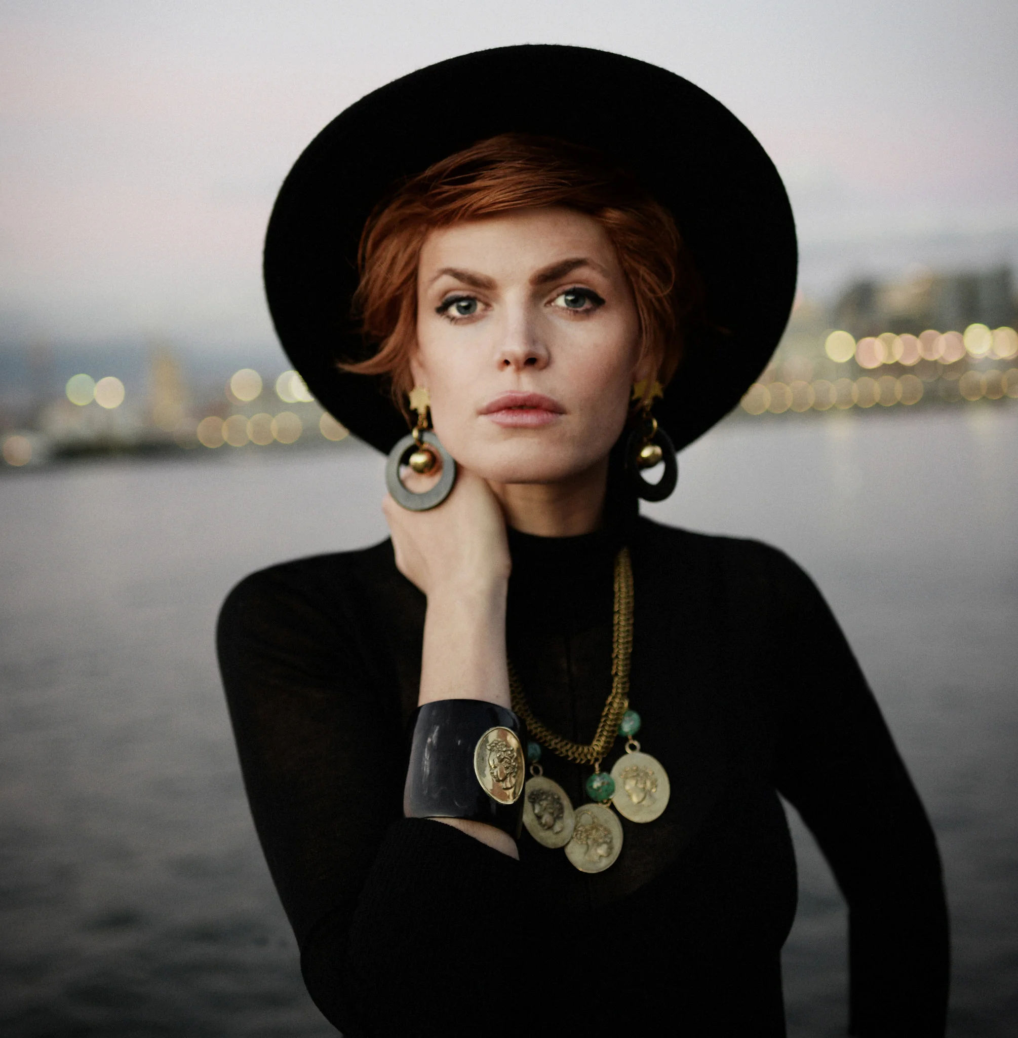 Christina wearing Cameo Cuff & Necklace with Nuba Earrings. Photo by Eftihia Stefanidi, New York