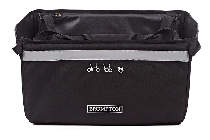 folding basket -Tote-style webbing straps for over-the-shoulder carrying. -Easy pull closure to keep contents secure -Zipped internal pocket -Reflective Scotchlite band -20 litres