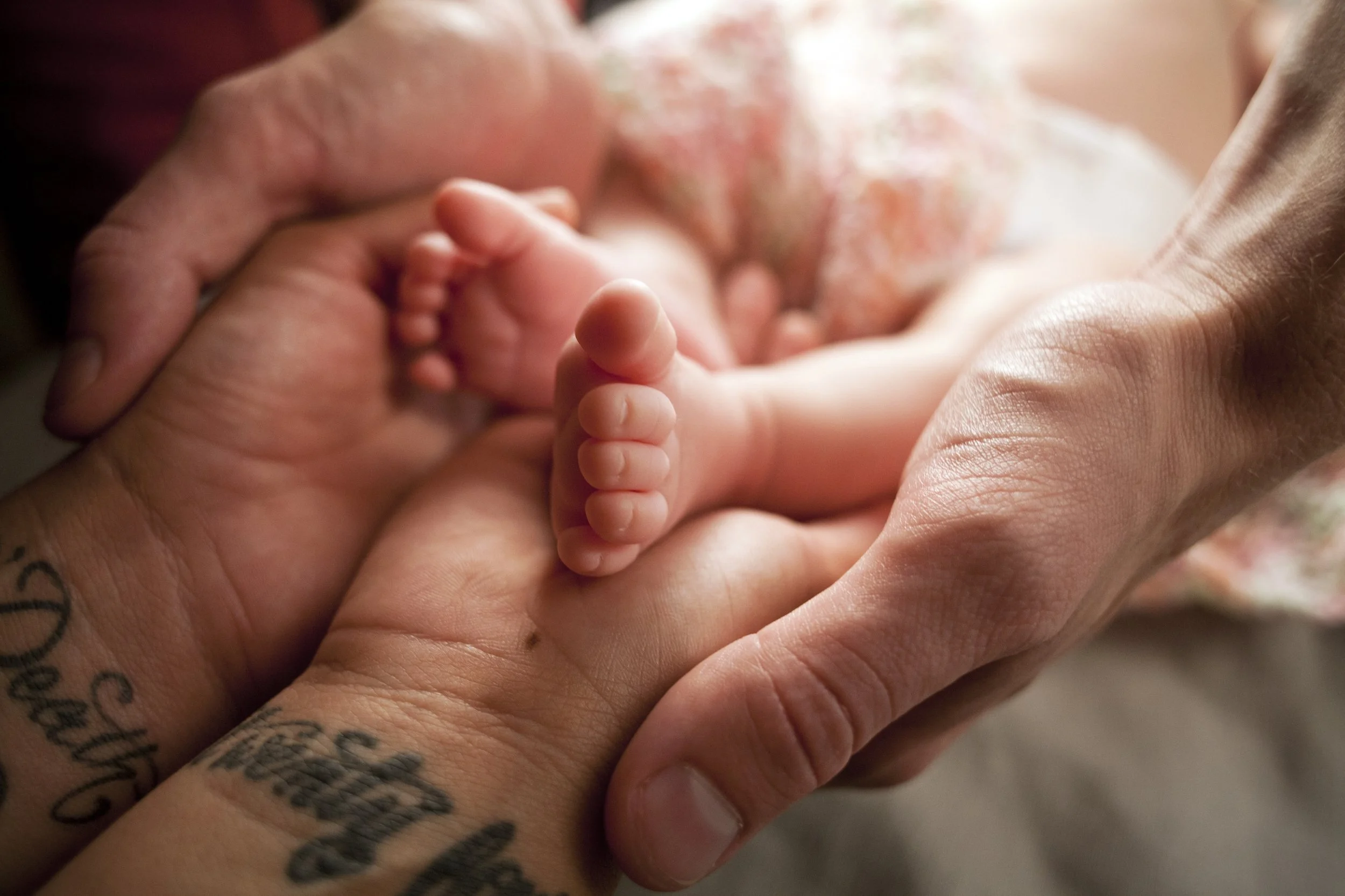 Studio infant portrait in Reno, NV highlighting baby’s features with professional lighting.