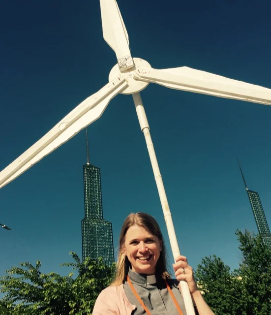 Rev. Jenny Phillips demonstrates for fossil fuel divestment at General Conference 2016.