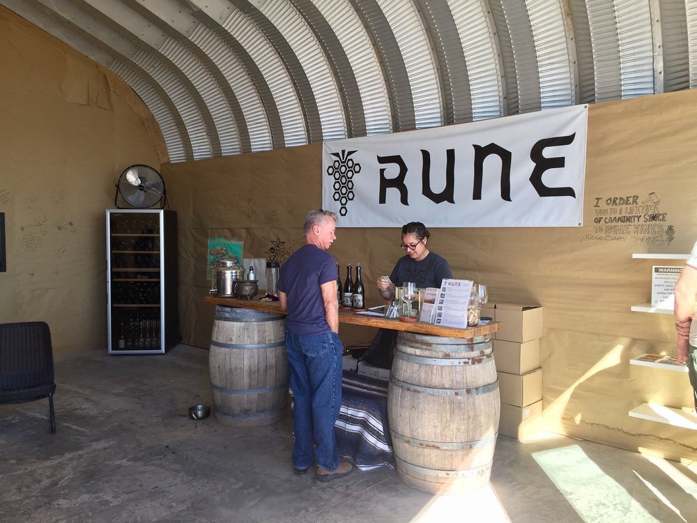 As the build out of our quonset hut slowly progressed, it became a makeshift tasting room during inclement weather. Temporary paper walls unexpectedly became a customer favorite as we allowed guests to leave their mark!