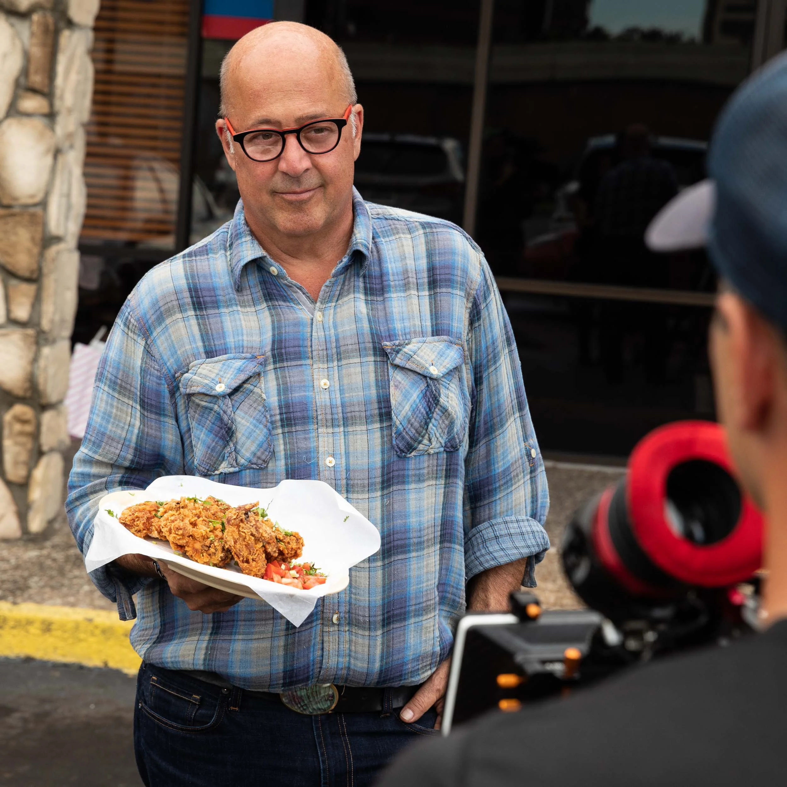 Andrew Zimmern filming his show at Himalaya Restaurant