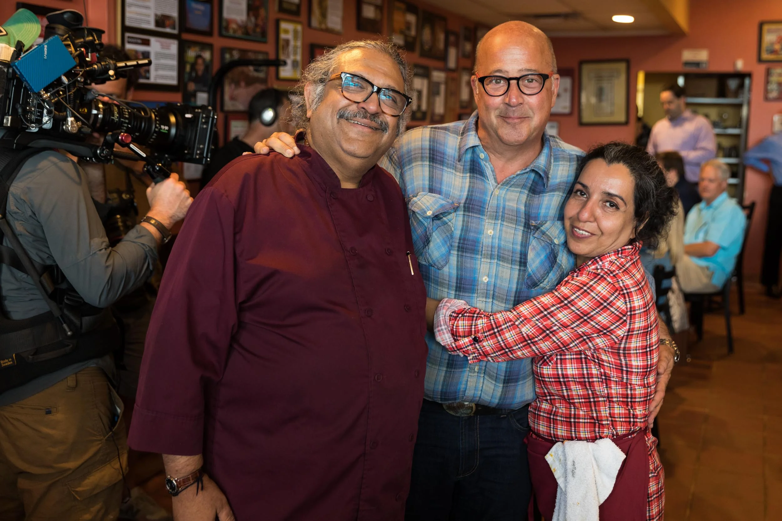 Kaiser and Azra Lashkari of Himalaya Restaurant with Andrew Zimmern
