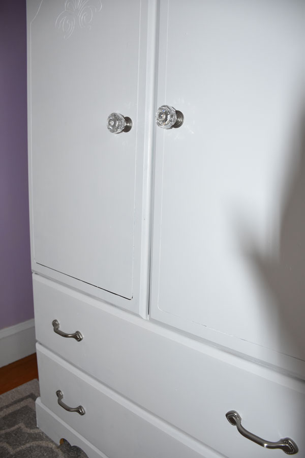Refinished their furniture and added crystal hardware to match the bed posts