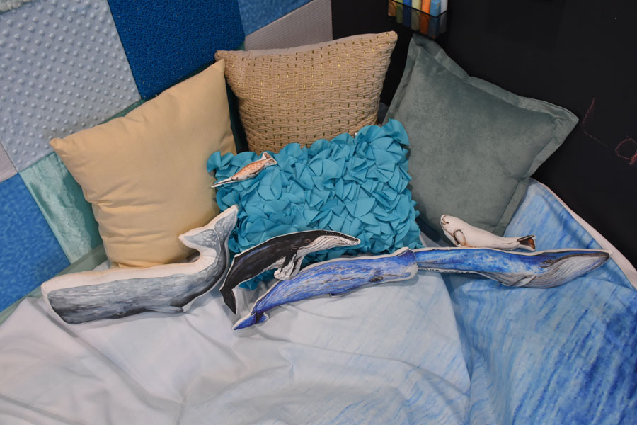   Beautiful whale pillows to help calm him down while "crashing" in his personal ocean  