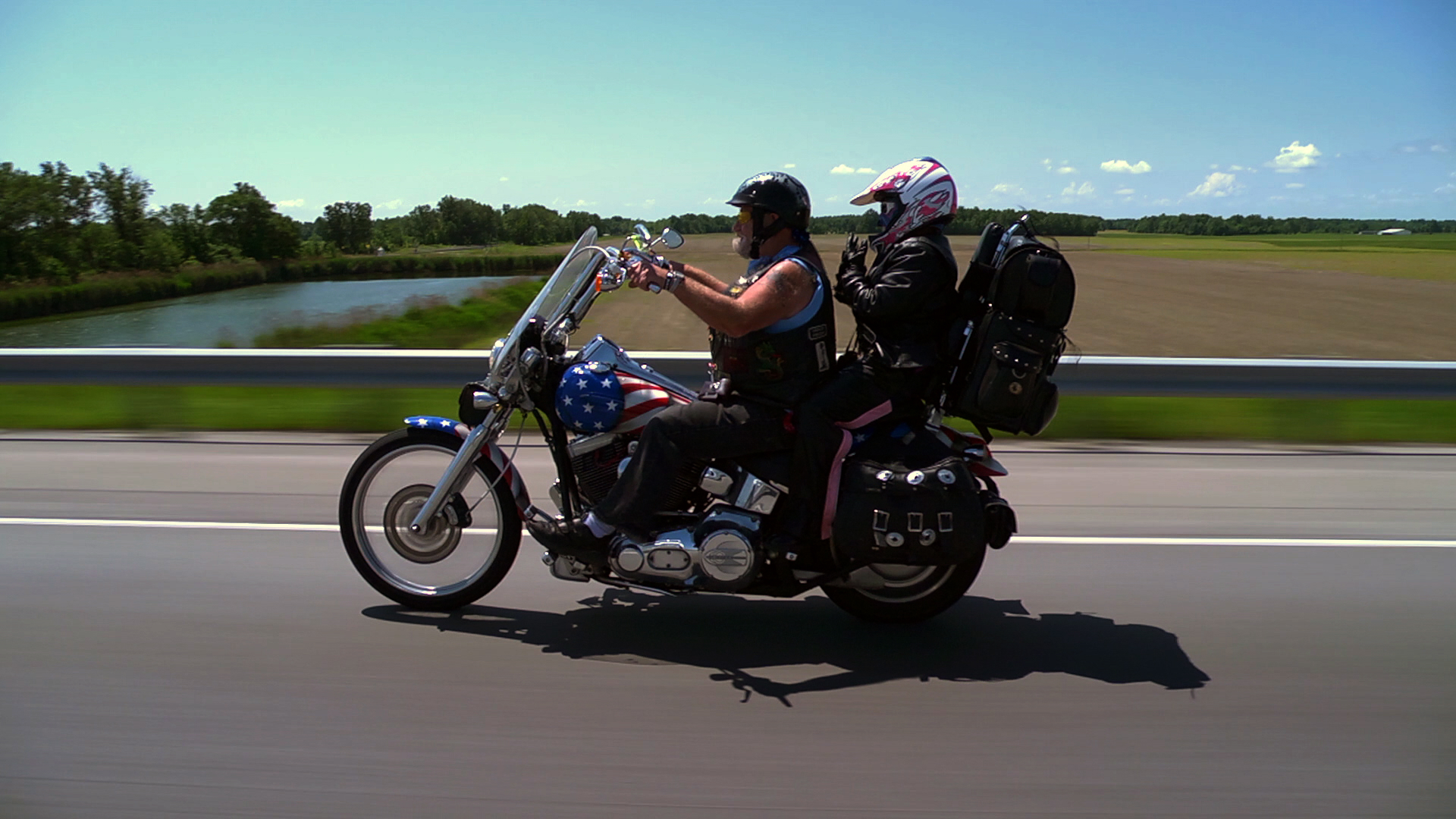 Ron and Alicia on bike.jpg