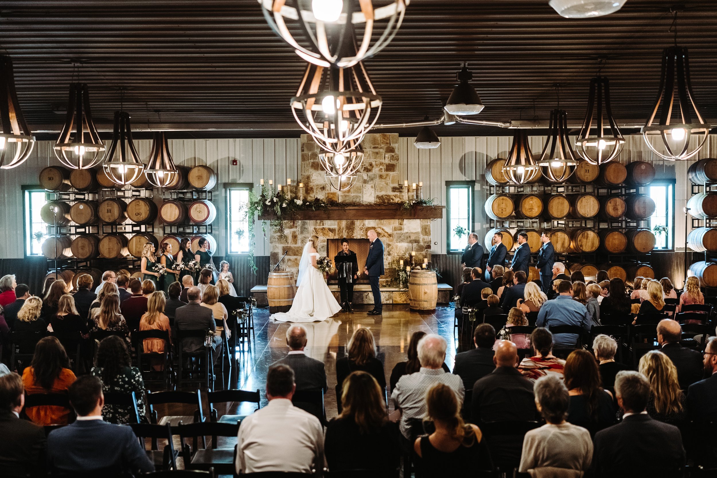 In-door ceremony in front of the stone fireplace in The Grand Hall.