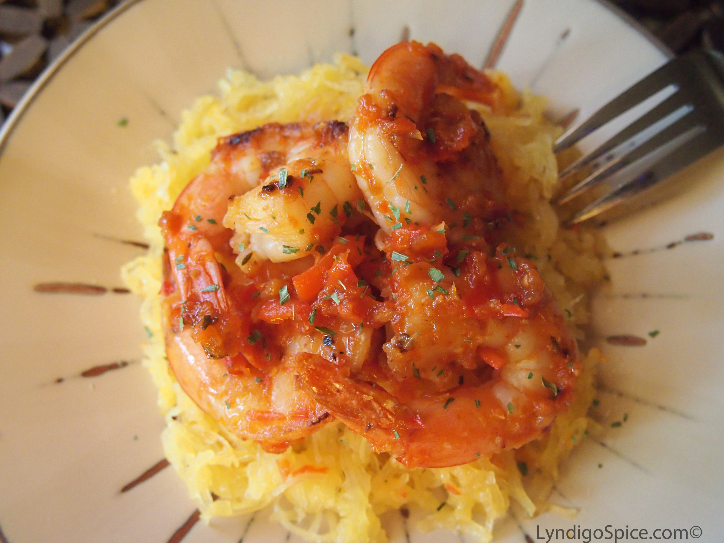 My good friend Autumn Reign and many of my customers at the Farmer's Market told me that they stir fry shrimp with Lyndigo Spice Red Pepper Relishes. I tried it here with the Spicy Relish on top of spaghetti squash. Delish!