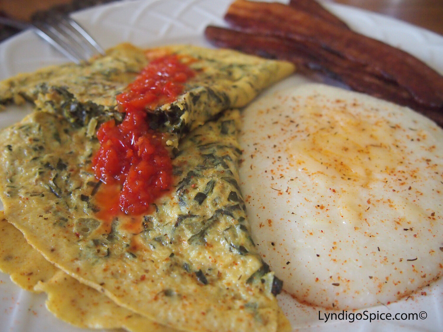 Collard Green Omelette with Spicy Red Pepper Relish, Original Spice Rub seasoned grits.