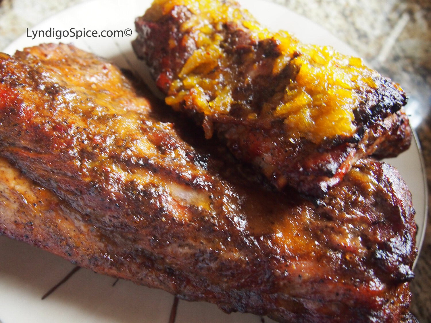 Jerk Baby Back Ribs with pureed Pineapple Chutney as a glaze.