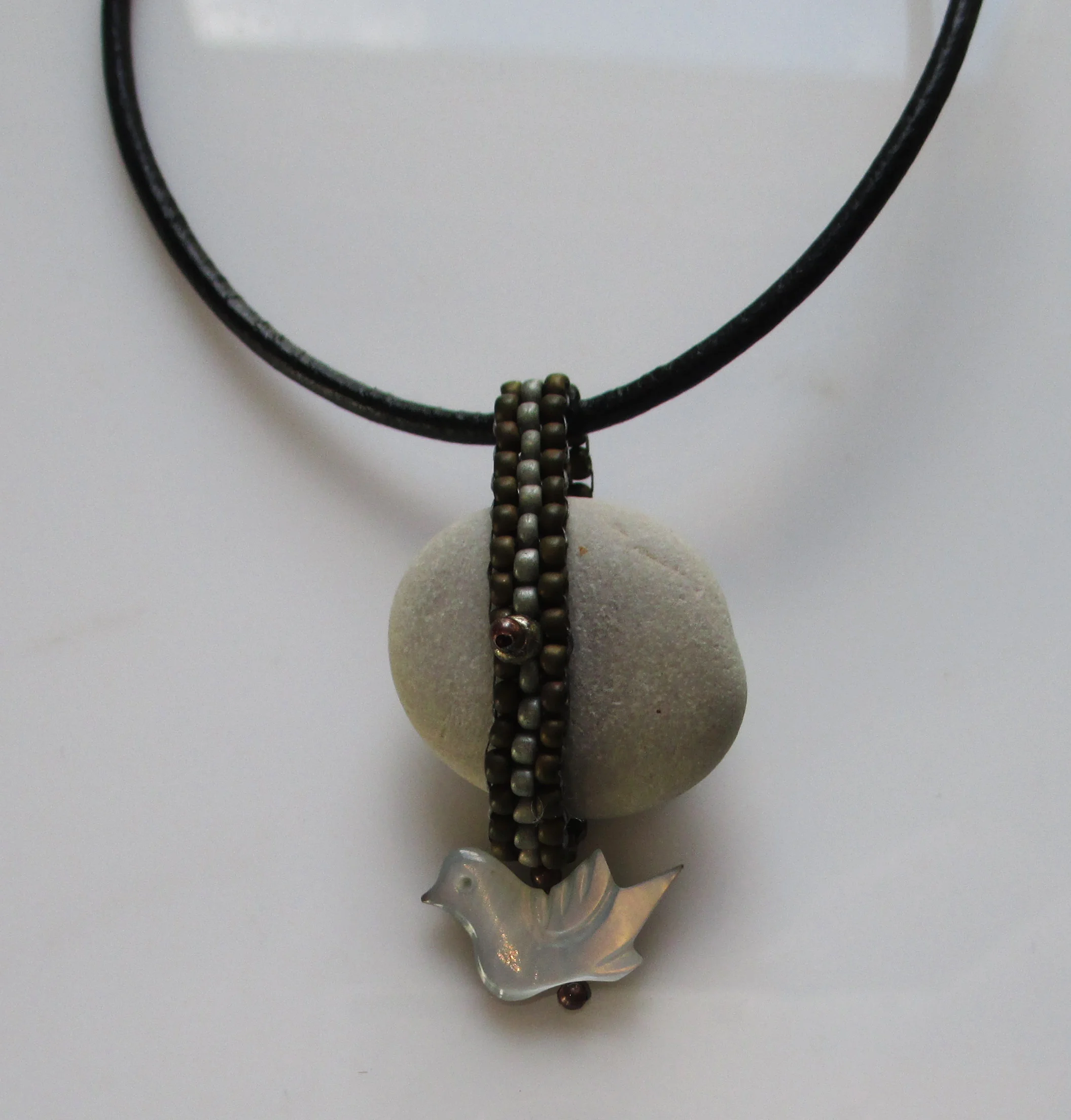 Stone Pebble and Mother of Pearl Bird Pendant