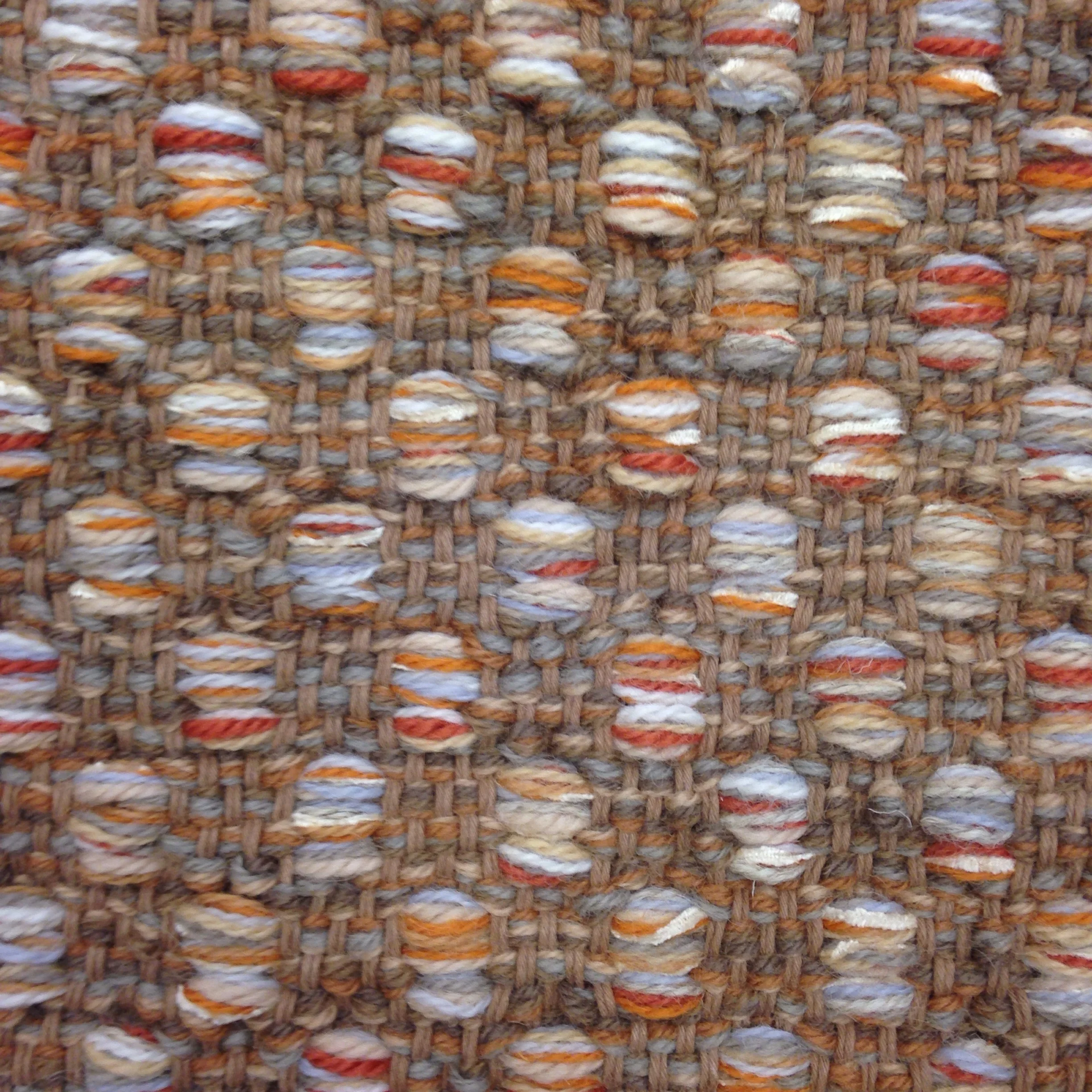 Mosaic hand woven rug.
