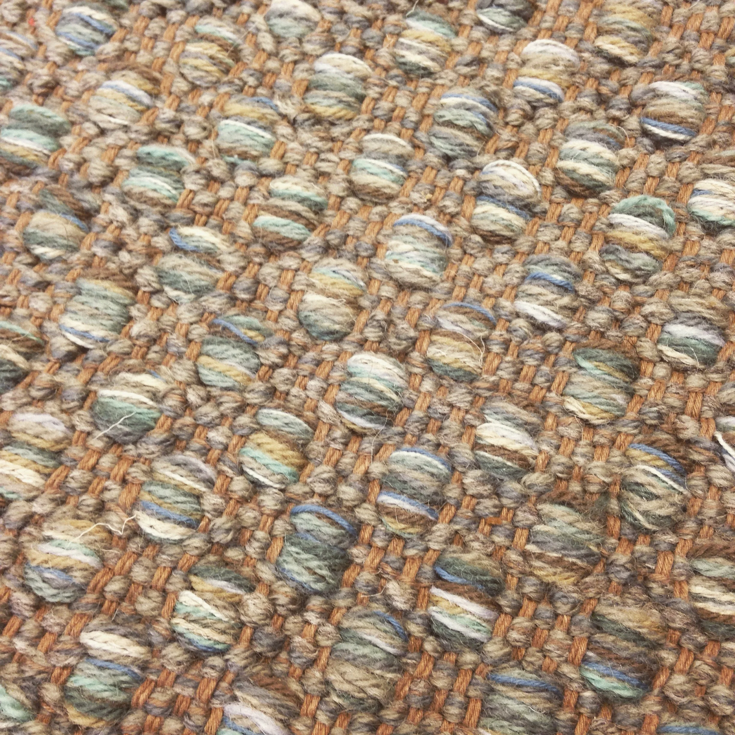 Fresh color of our Mosaic handwoven rug.
