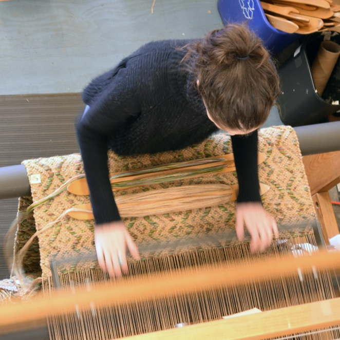 Meg weaving.