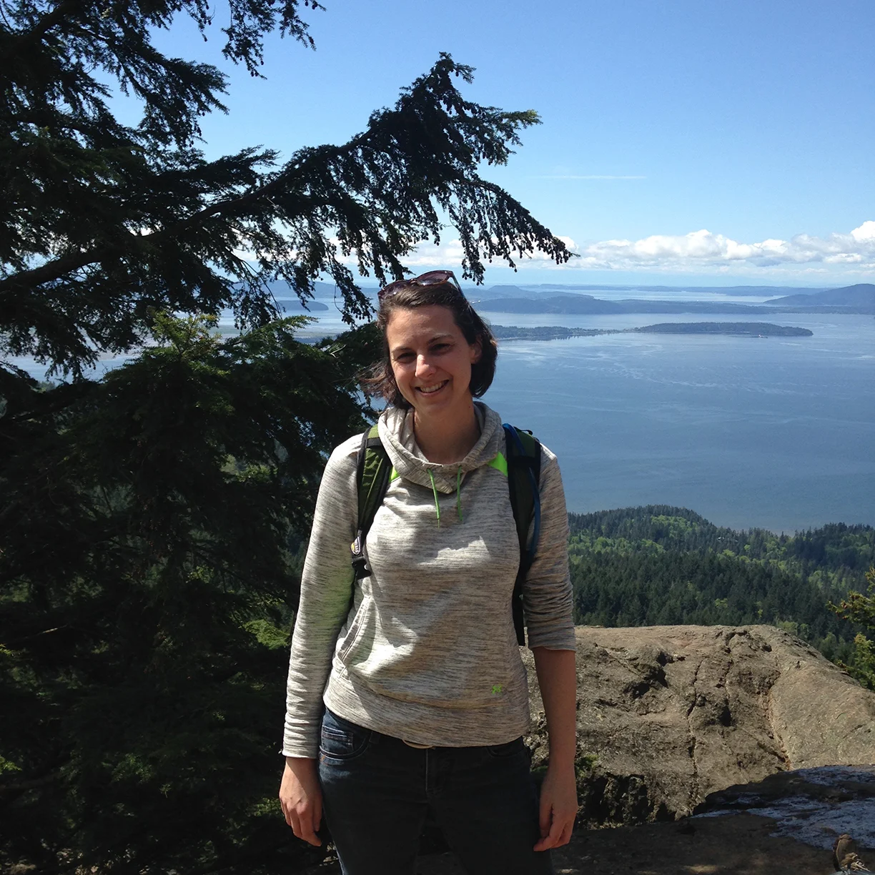 Amy Tyson with view from Oyster Dome, WA.