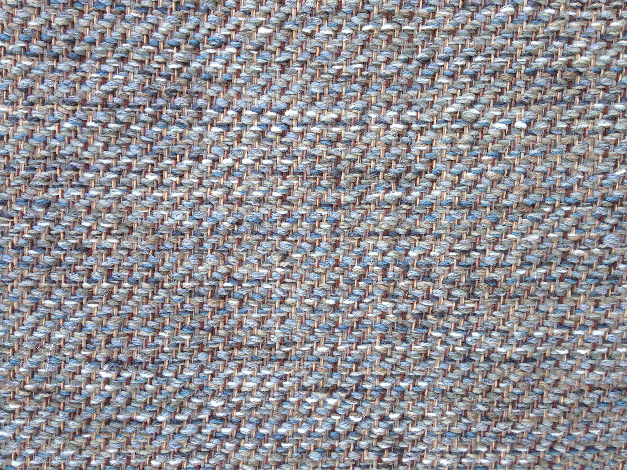 Similar to the blue of jeans, this rug uses many colors of blue to create interest.