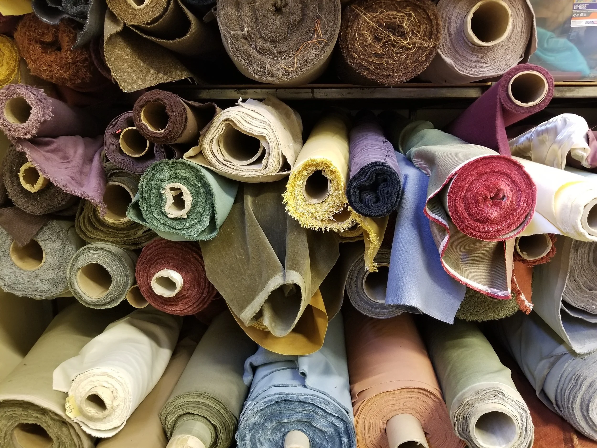 Fabric rolls in the True North Textiles shop.