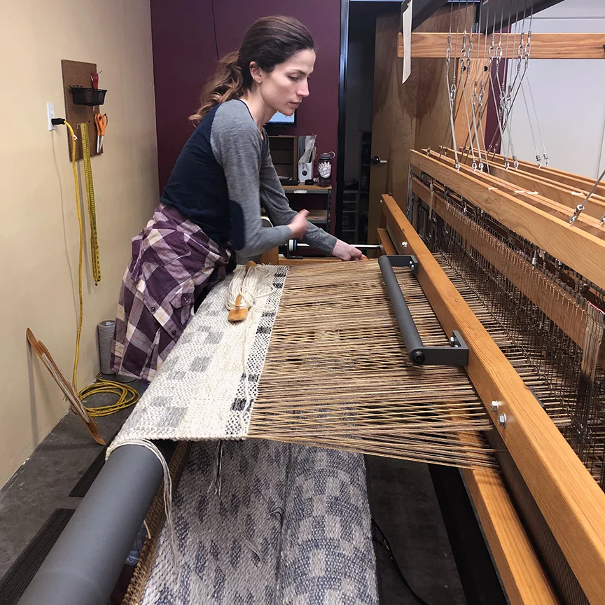 Meg weaving a custom color Runway.