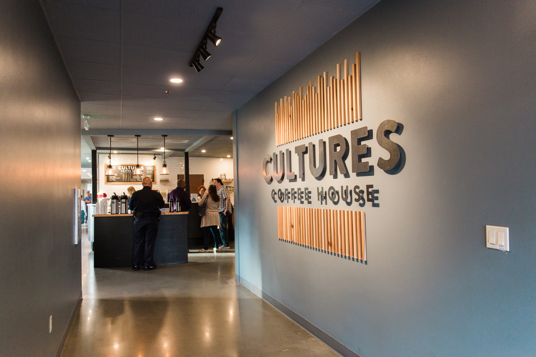  The hallway leading to Evergreen’s Cultures Coffee House, which is open to anyone on Sundays and during the week. 