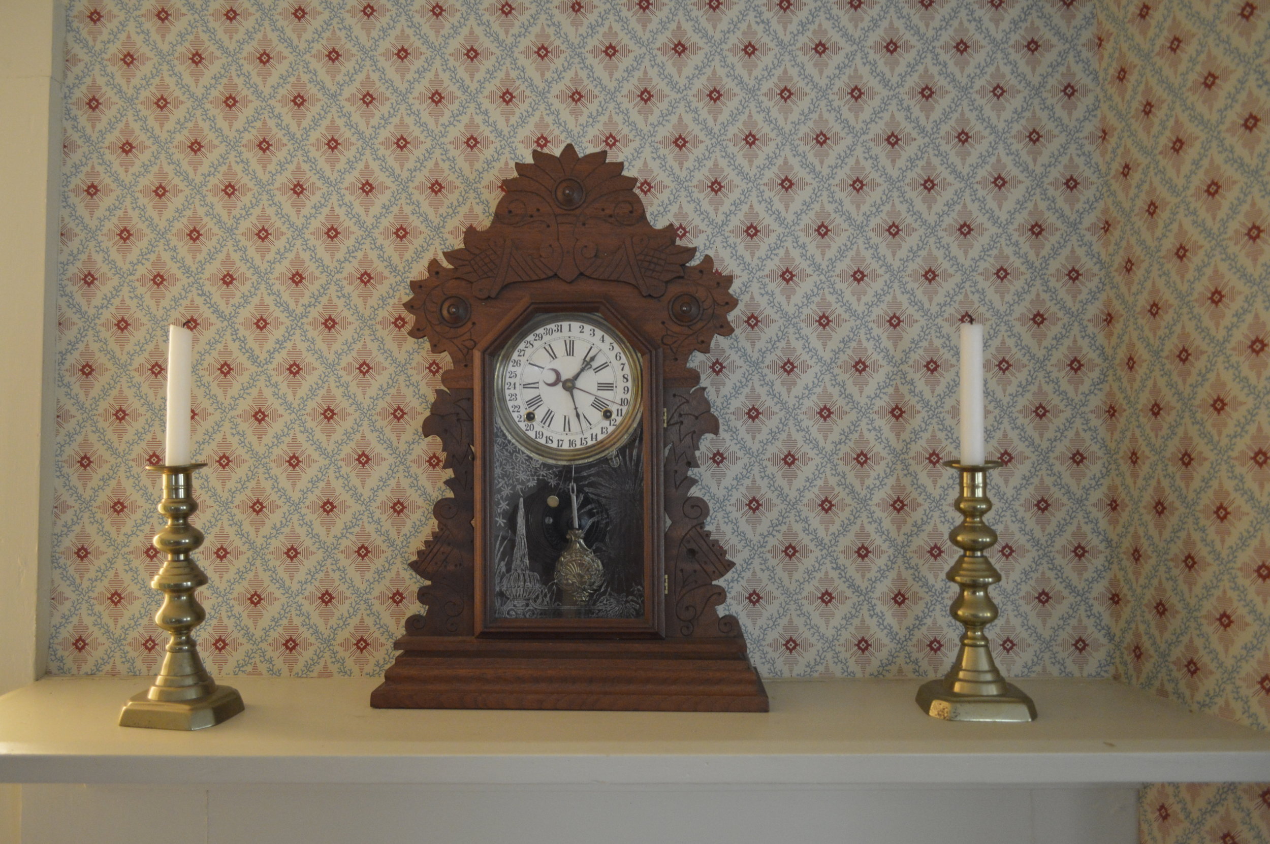 The wallpaper in the dining room is reproduced from a sample from the Chicago Historical Society. This 1860 pattern is called Gravenberg lattice. (Copy)