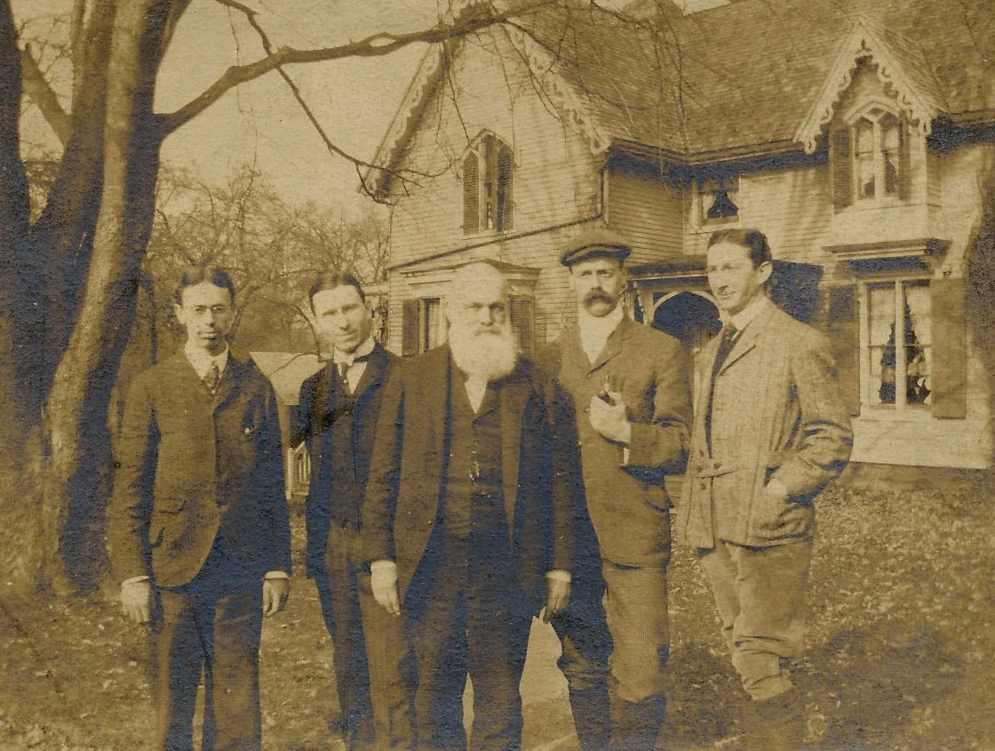 Charles Fleming and his sons in front of the Fleming-Hill House, date unknown.