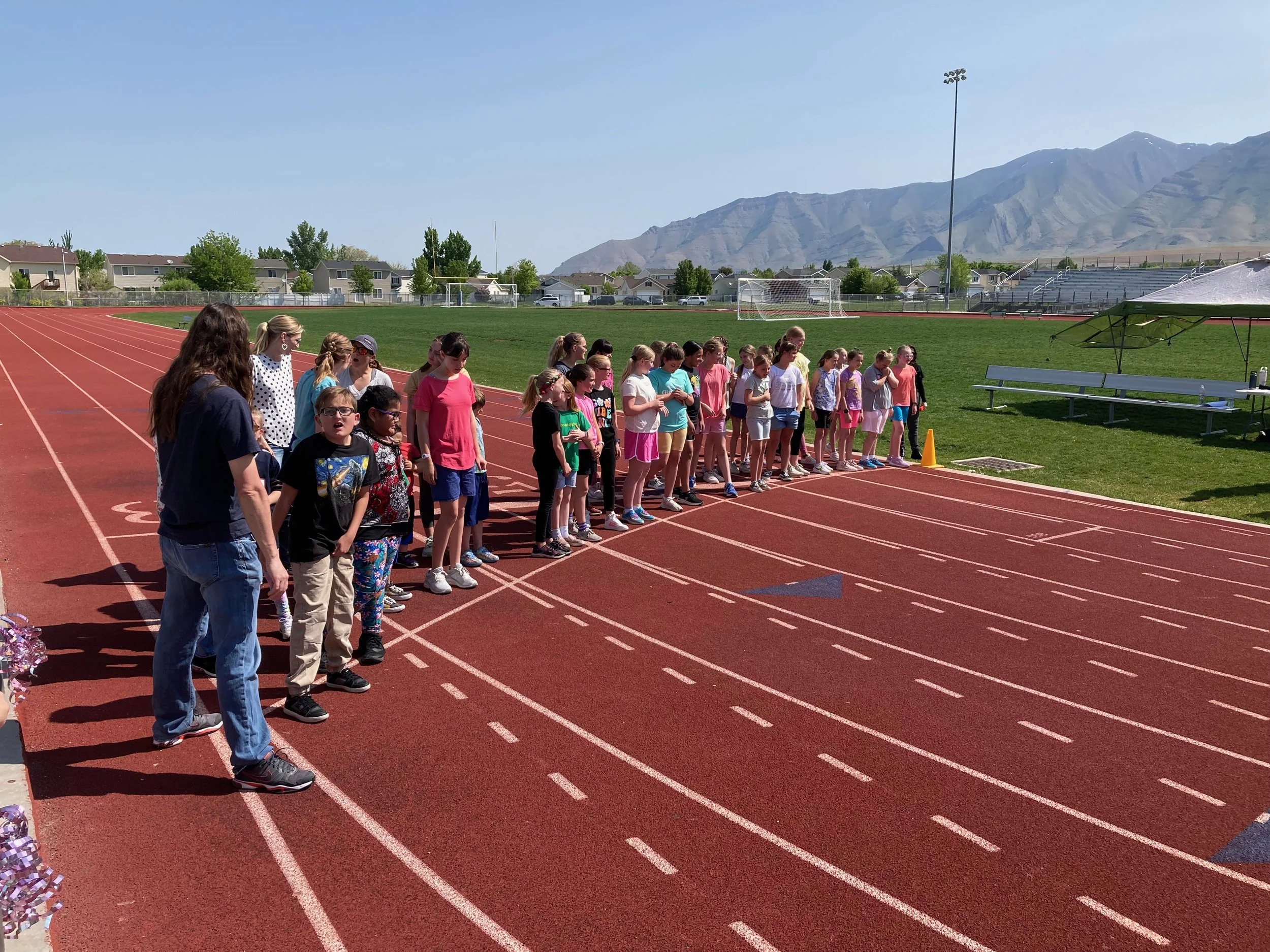  Claire’s class lining up for the mini-marathon. She went on to take first. Max took third in his, Ailie got eighth (but ran consistently the whole time, most people did bursts and stops), and Elly enjoyed strolling with a friend who was sad. 