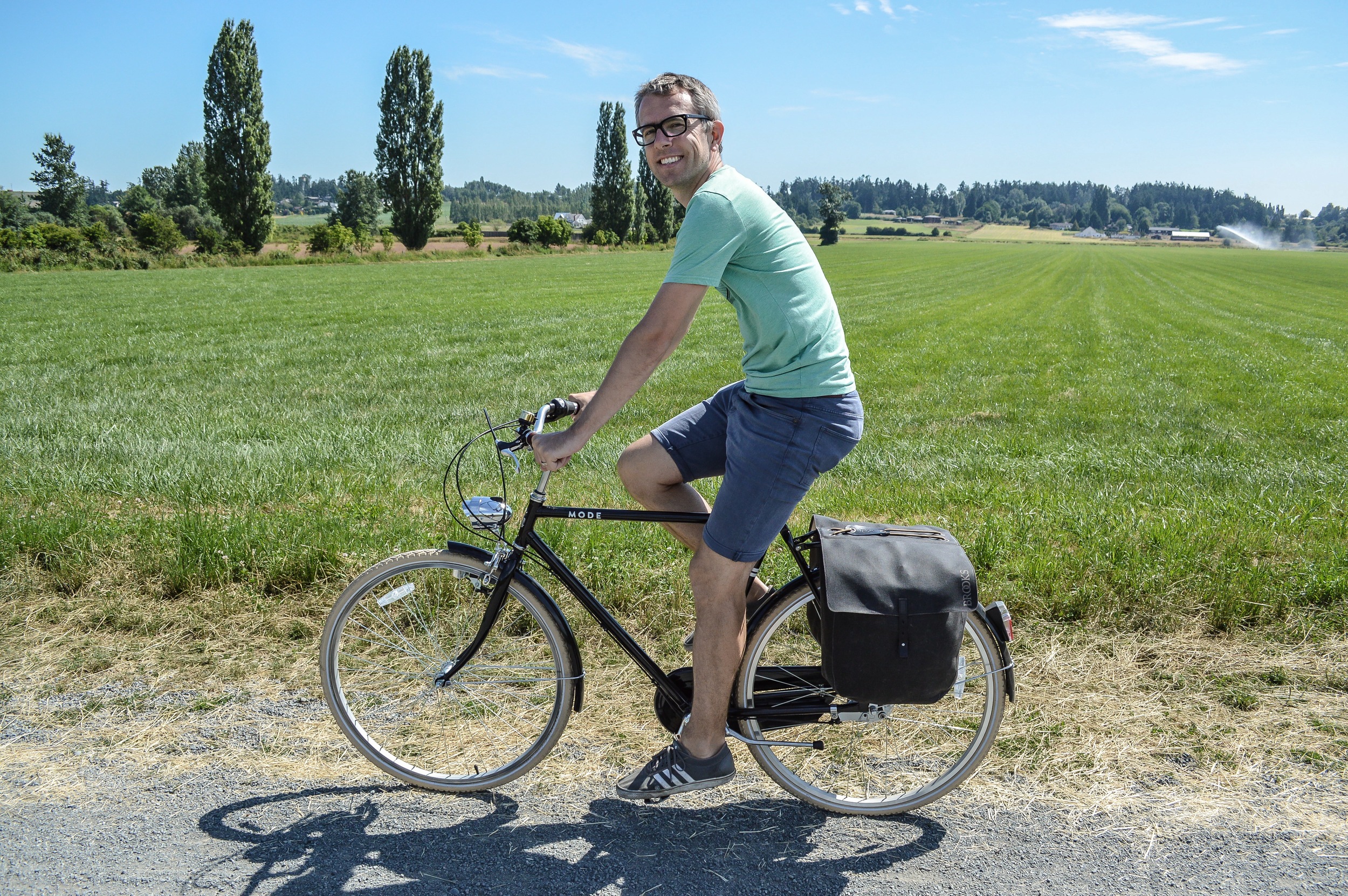 This handsome man stays fit and healthy simply by sitting on a saddle and going for a ride to work each day.