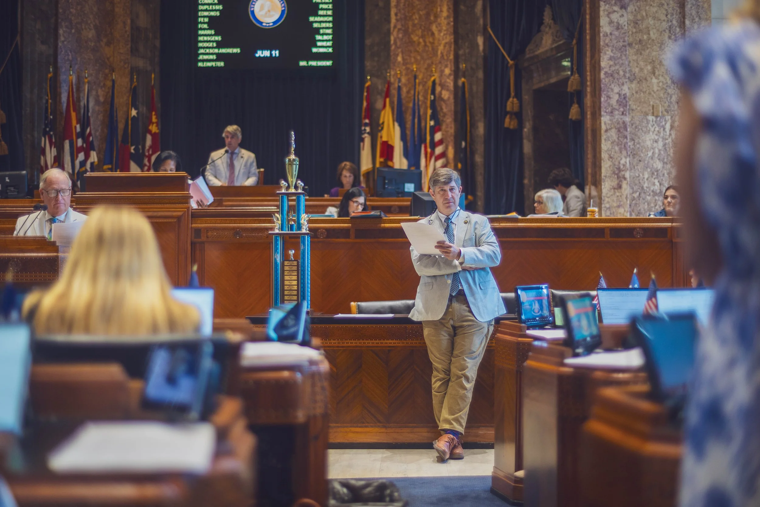 Senator Talbot listens during debate