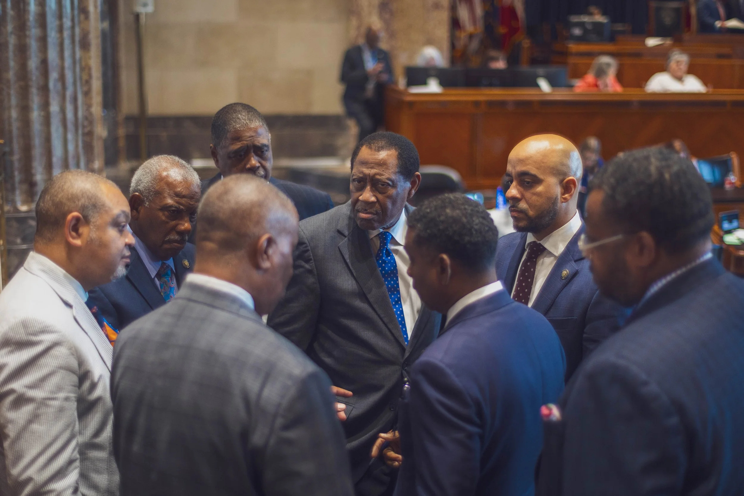 Senators confer during the final days of session