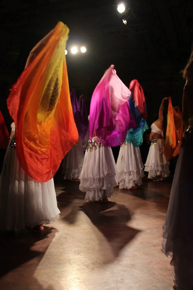 Intermediate students perform a veil dance