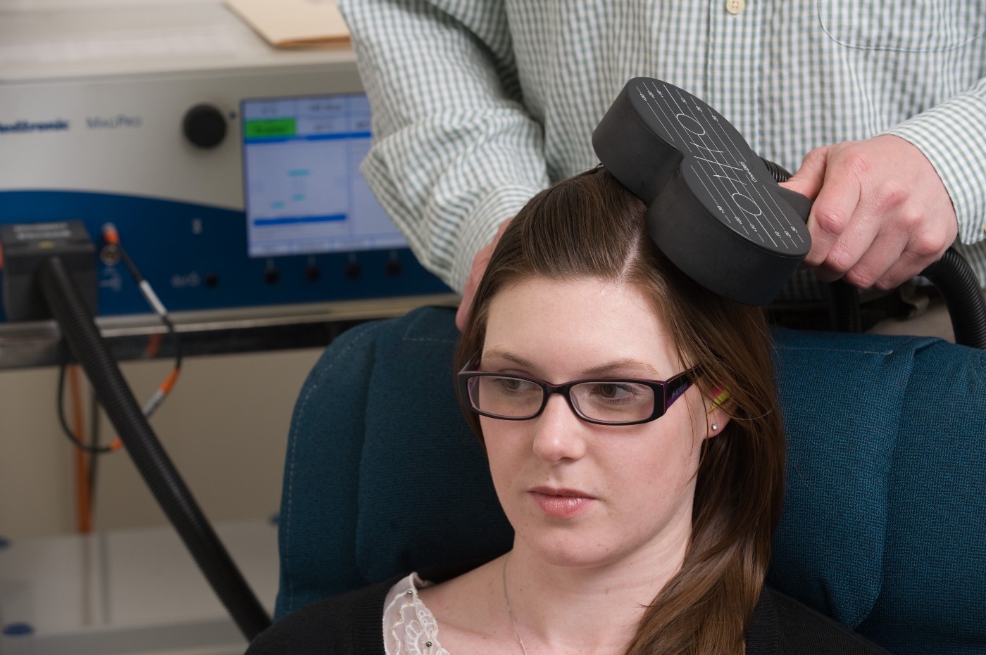 Transcranial Magnetic Stimulation (TMS) in action. (Photo credit: Monash University)