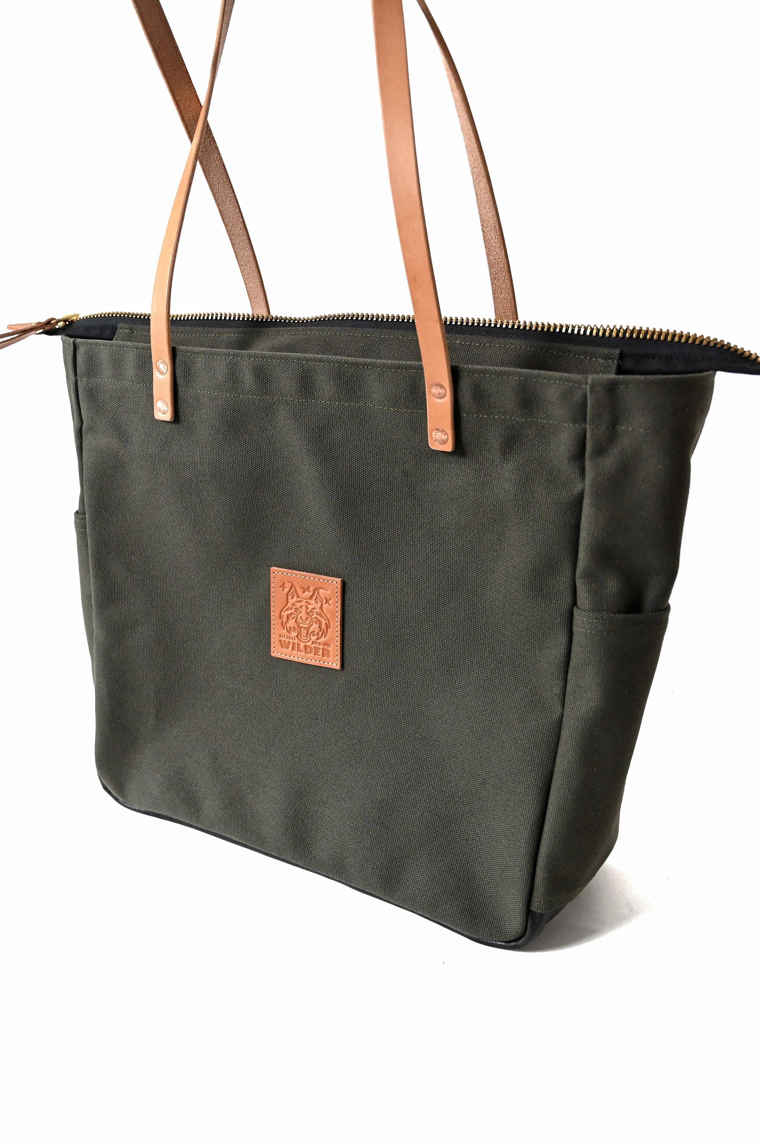 Pine_green_tote_bag_side_leather_canvas.jpg