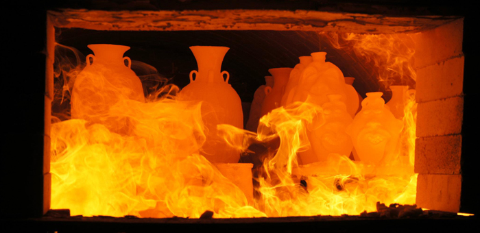 Pieces are fired inside the kiln.