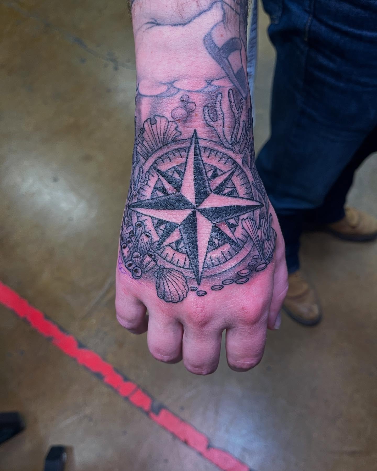 A nautical compass made by James here at @bethesdatattoo #bethesdatattoo