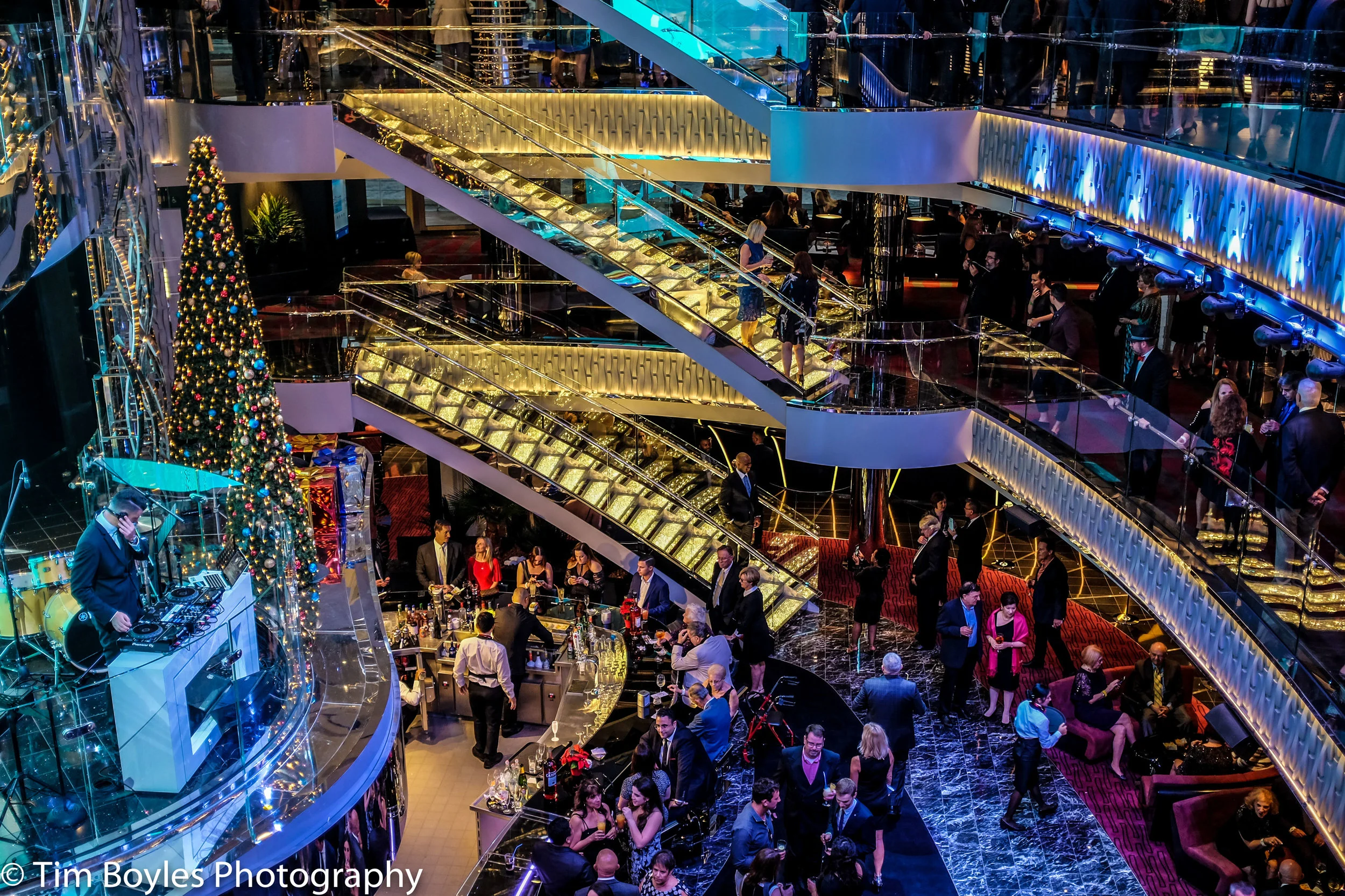 People party inside the atrium on the MSC Seaside during its naming ceremony in Miami, Florida, December, 2017.