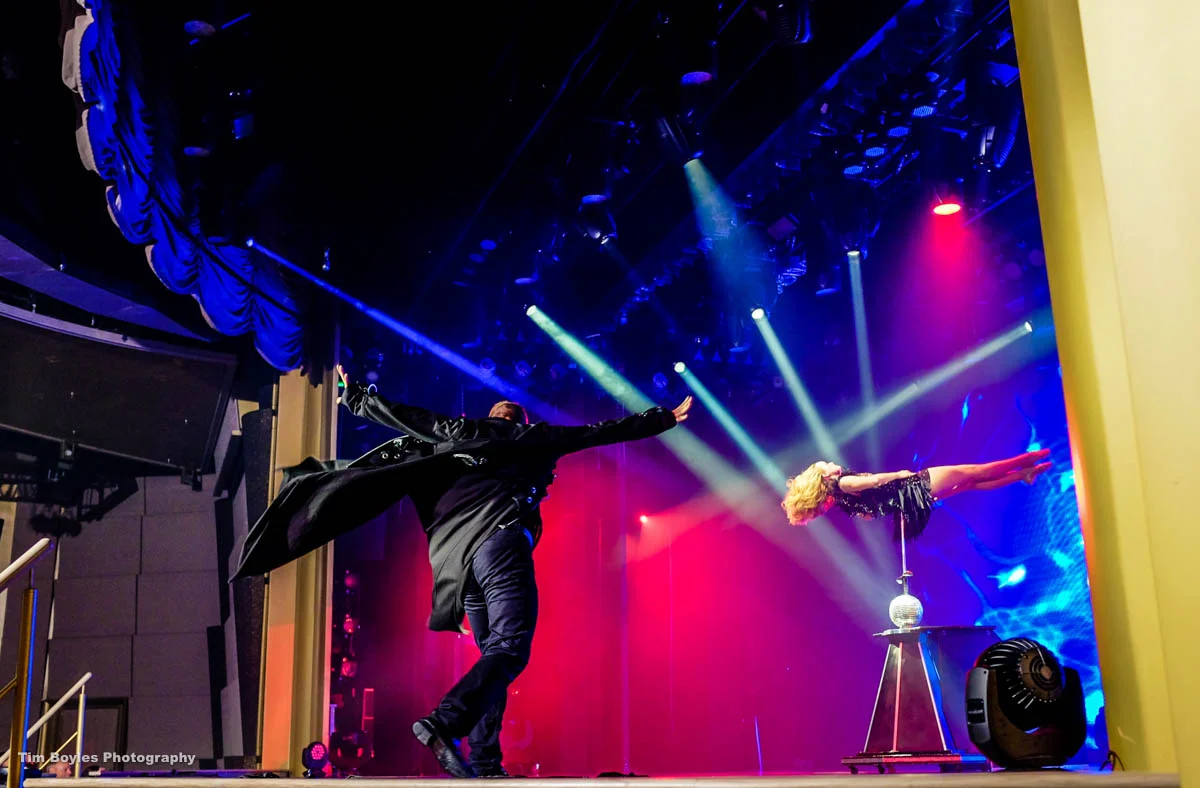A magician performs onboard a cruise ship in September, 2016.