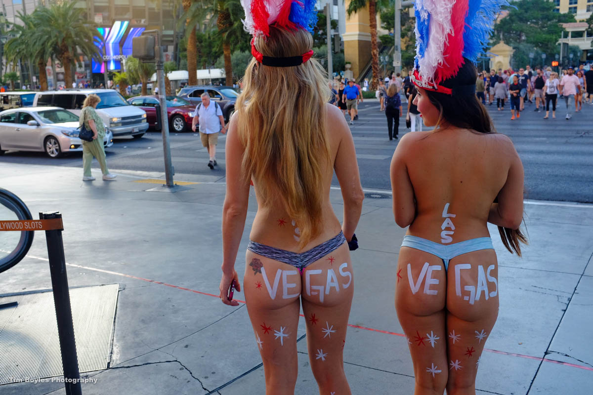 Two semi-nude girls welcome visitors to Las Vegas, Nevada in April, 2016.