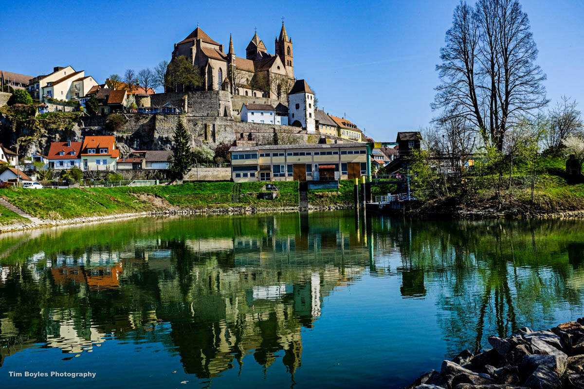 A German historical site is reflected in a pond in Germany.