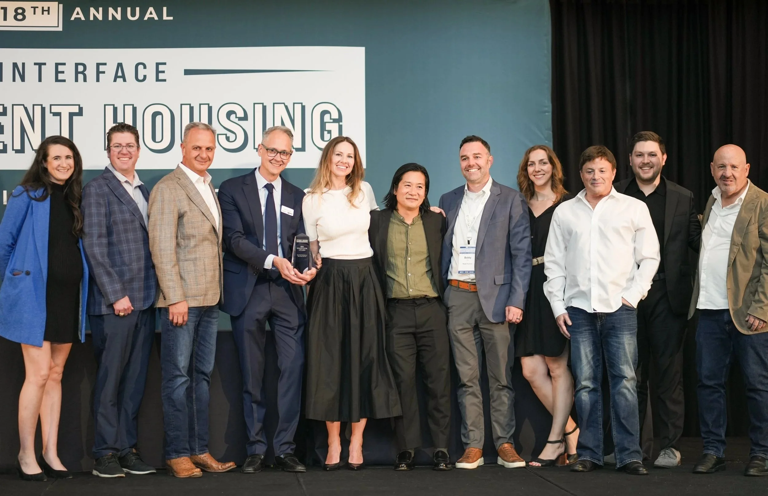  Development, architecture, and engineering representatives take the stage to accept the award for Best New Development Award >400 Beds. 