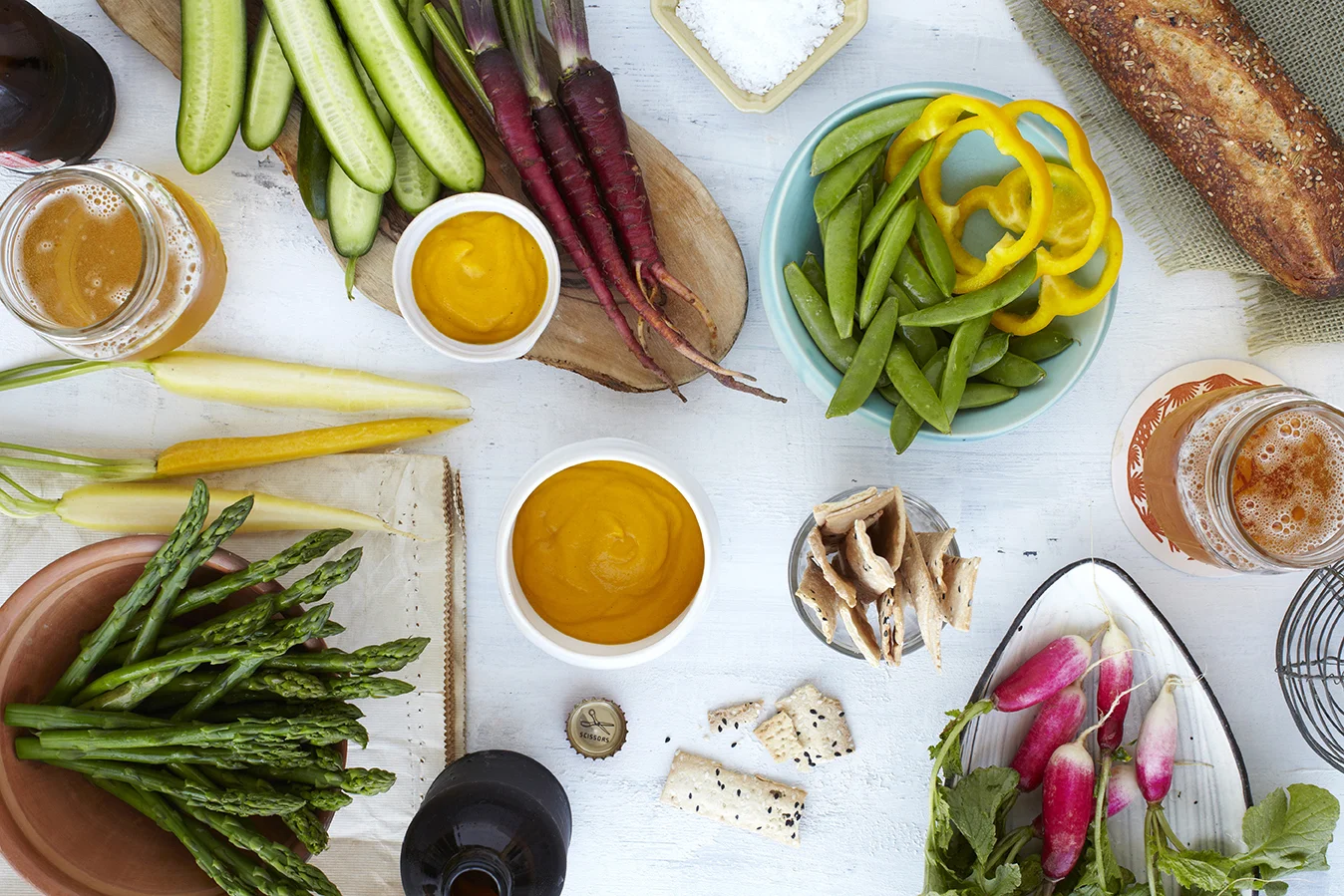 Fresh vegetables, crispy crackers and crusty bread to dip in Ginger Carrot