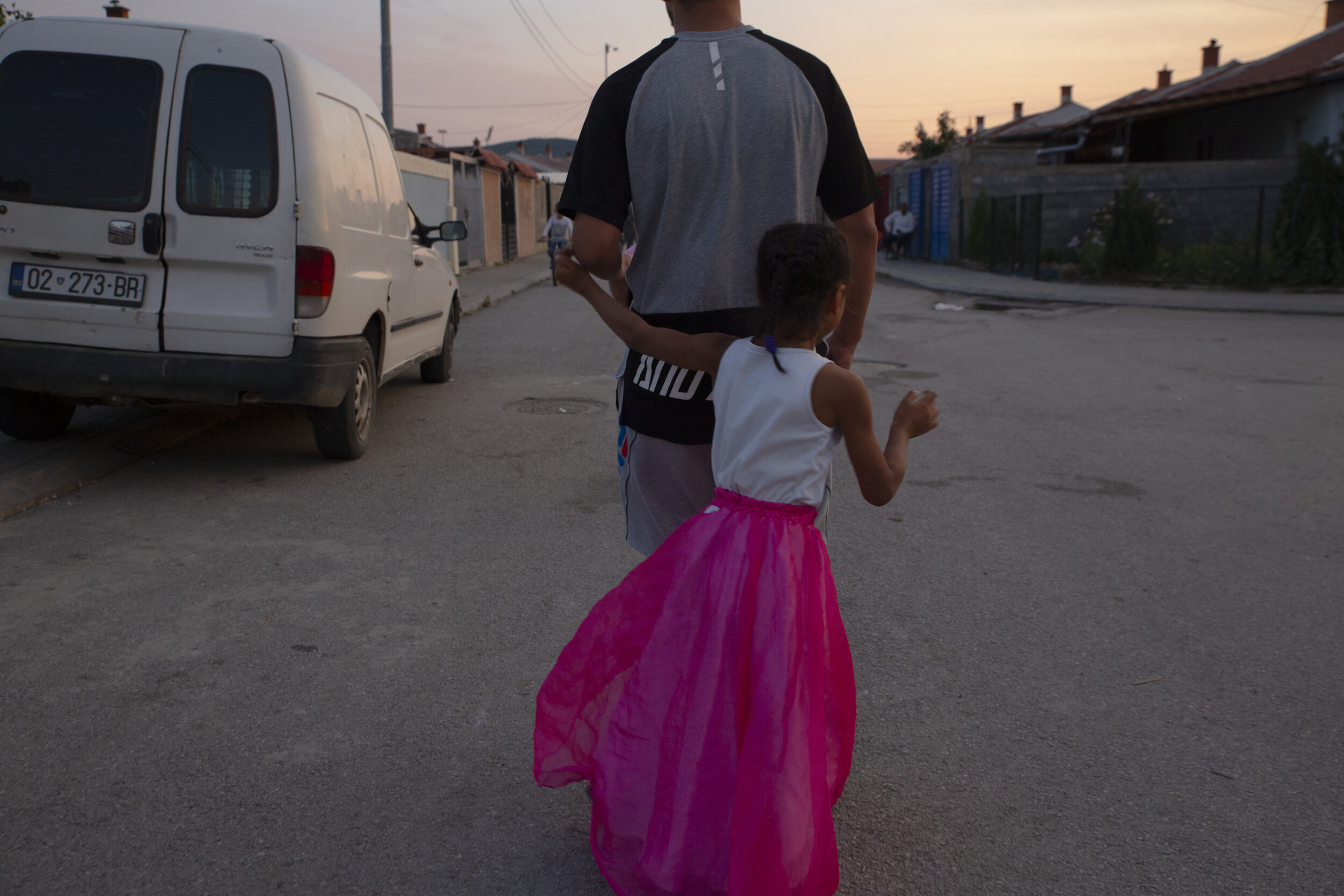  Teenagers and children play on the streets of Roma Mahala at dusk. About half of the people in Kosovo are under 25, making it the youngest population in all of Europe. 